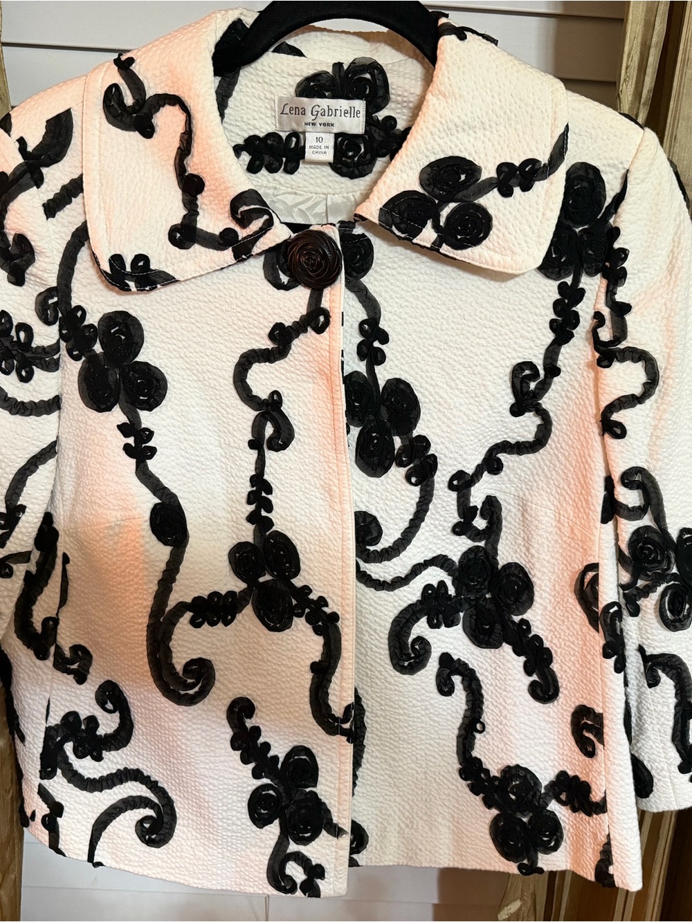 Lena Gabrielle White Textured Blazer with Black Floral Appliqué